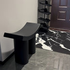 Sculptural Curve Stool – Monolithic Molded Seat with Dual-Cylinder Base